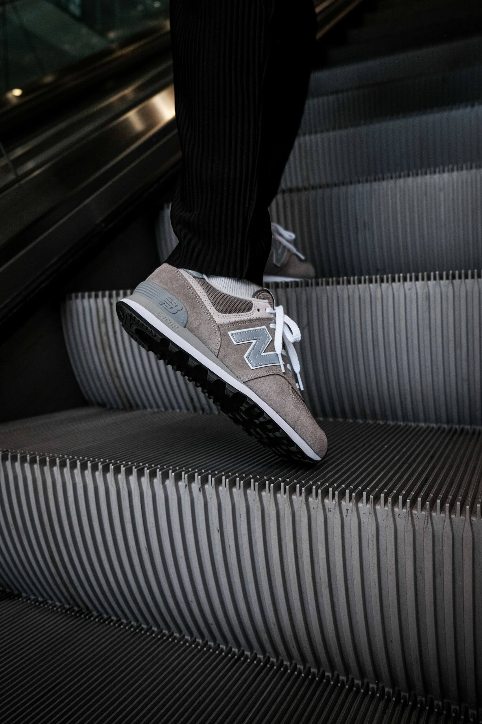 on feet photo of the New Balance M574EGG - The most New Balance shoe ever.