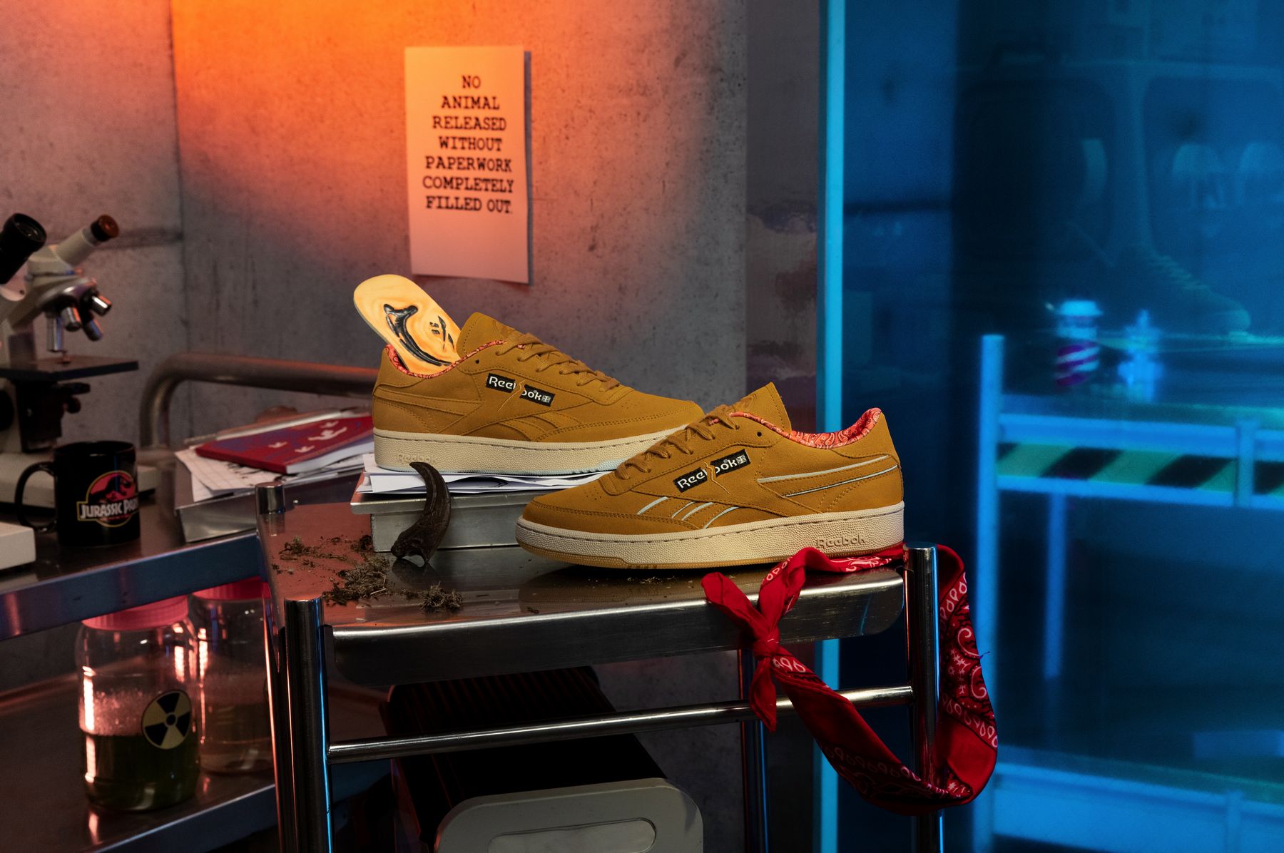 Reebok x Jurassic Park - Club C - rich ochre/diffused blue/stadium red - GZ6322