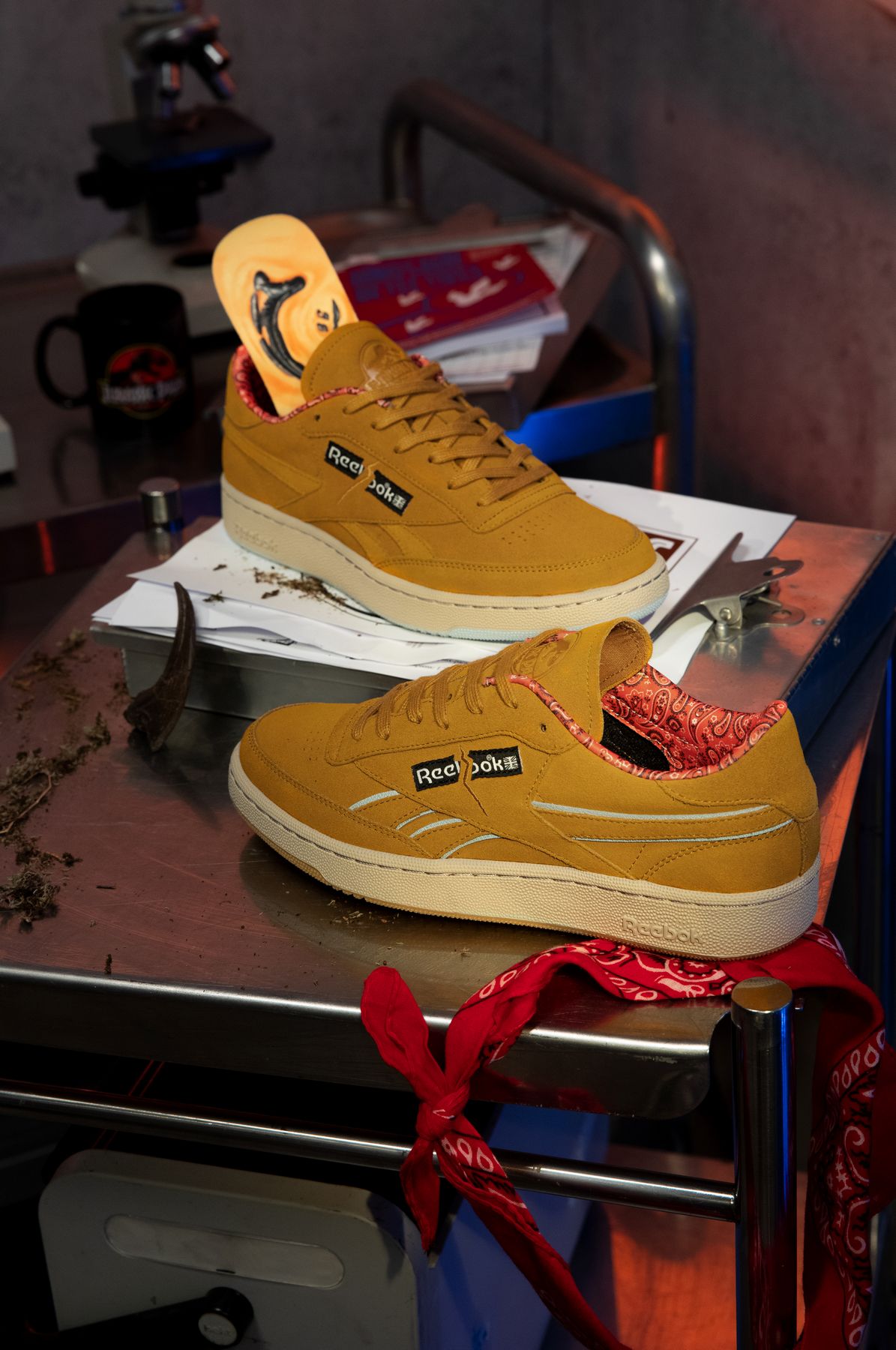 Reebok x Jurassic Park - Club C - rich ochre/diffused blue/stadium red - GZ6322