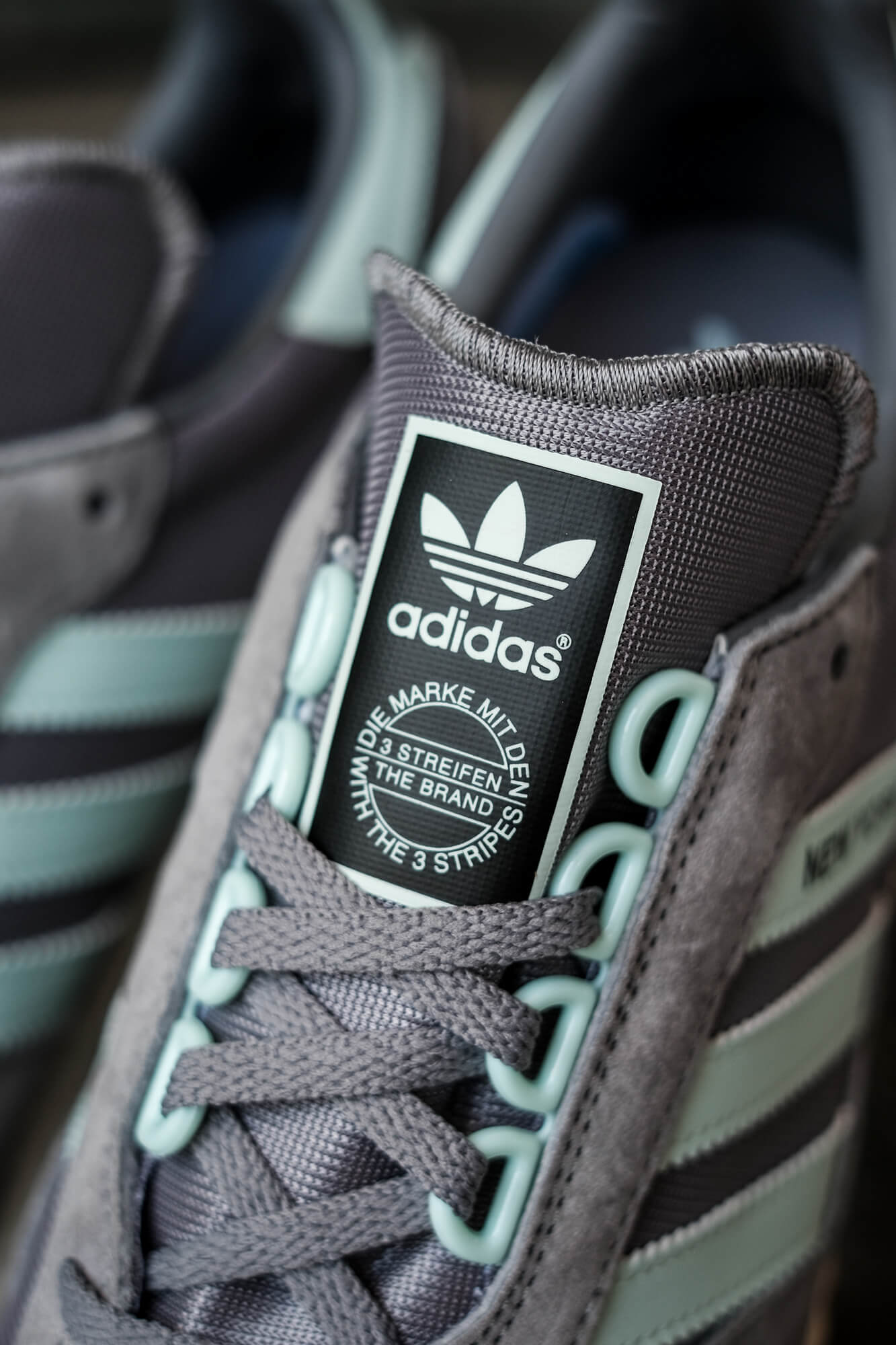 tongue logo trefoil - on feet photo of the adidas - New York "almost" OG - grey/halo blush/core black - GY0234