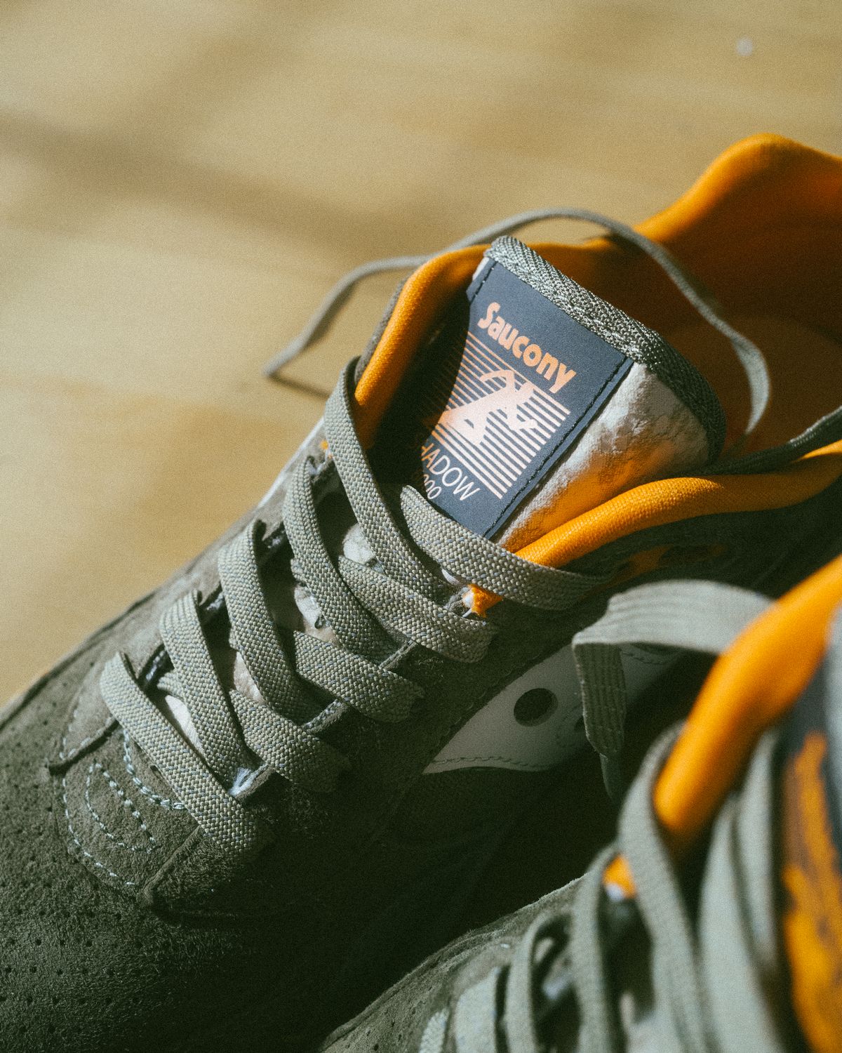 detail photo of the Saucony - Shadow 6000 - "Destination Unknown" - olive/orange - S70587-1