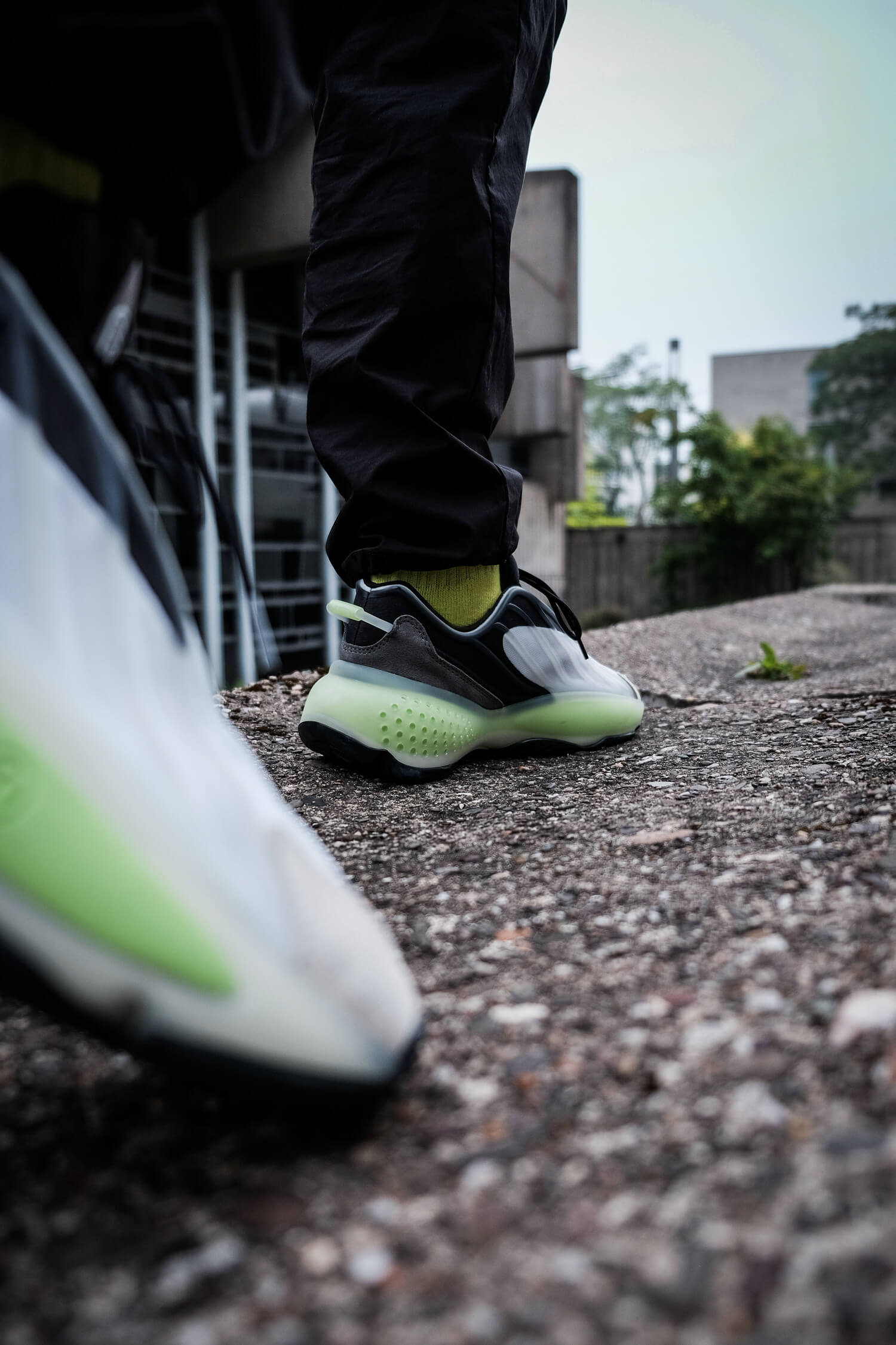 adidas - Ozrah - black/white/yellow - H04207 on feet photo
