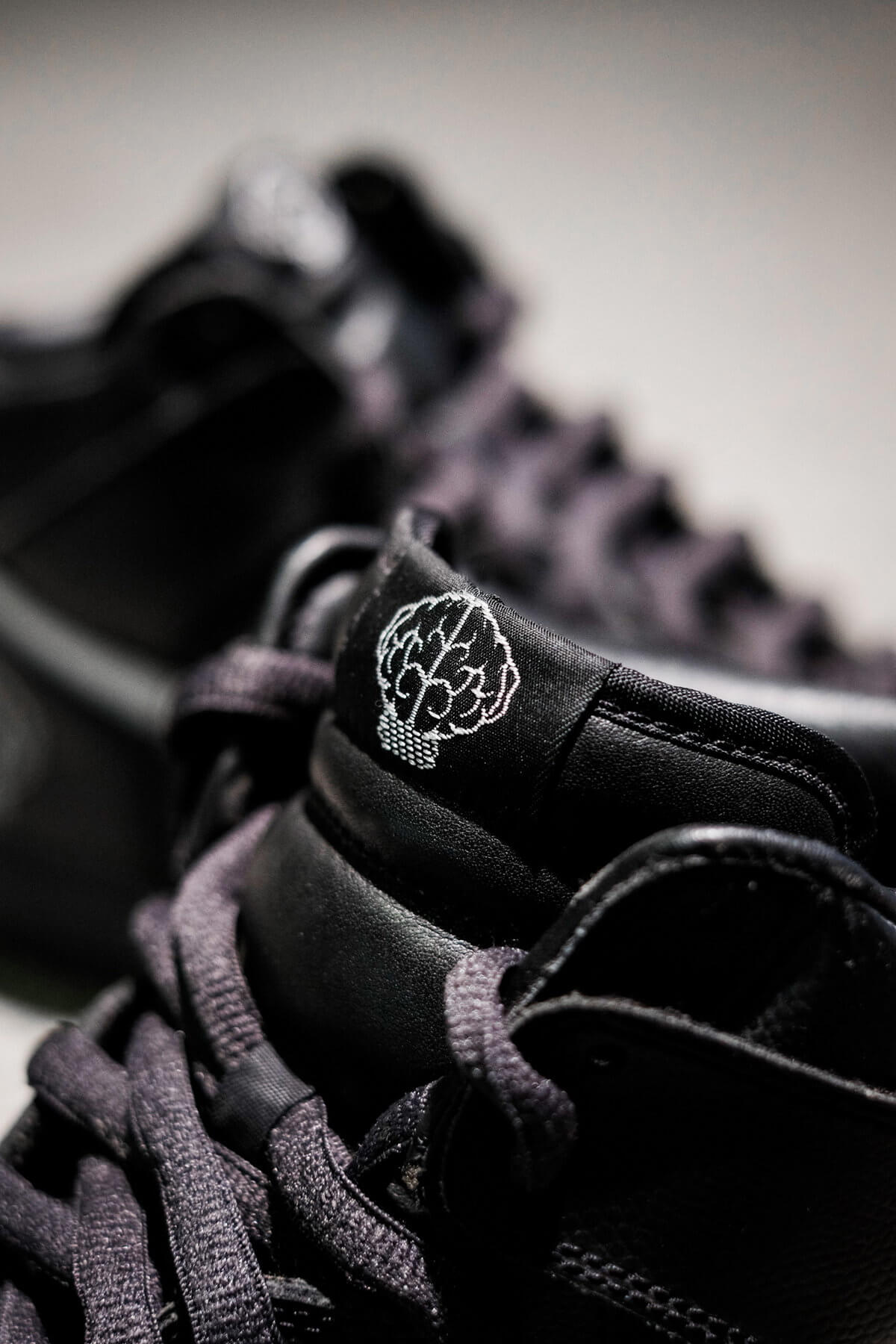 brain logo on tongue detail - Nike x N.E.R.D - Dunk Hi - Artist Series - black/metallic silver/varsity red - 308418-001