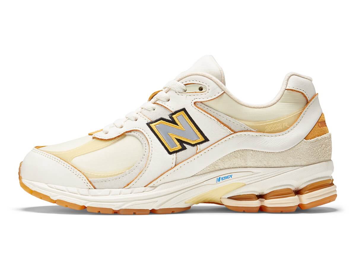 product, side view - New Balance x Joe Freshgoods - Conversations Amongst Us - 2002R - Dawn Glow/Sea Salt - M2002RJ1