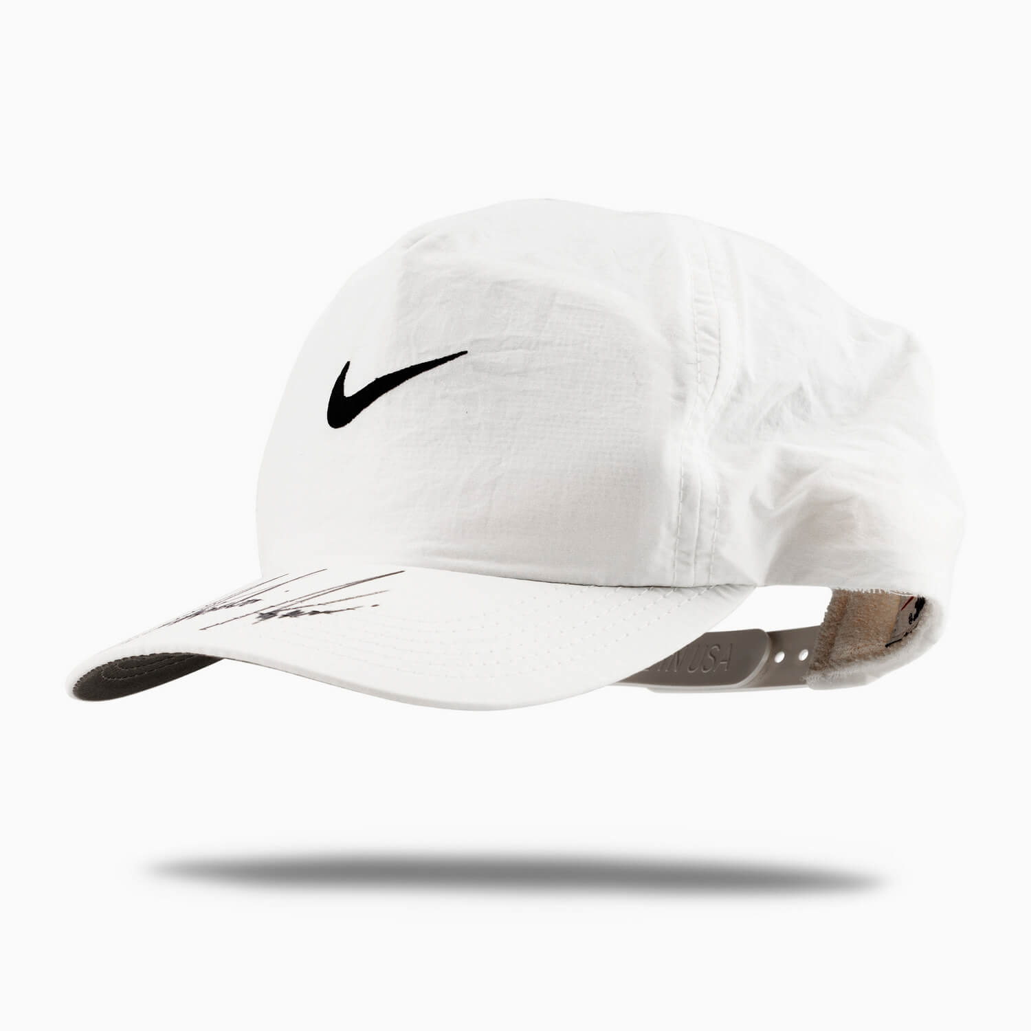 Swoosh Hat, worn and signed by Andre Agassi, 1996 © Nike, Inc.